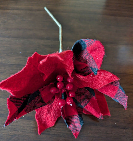 Plaid felt poinsettia pick 6.99  6